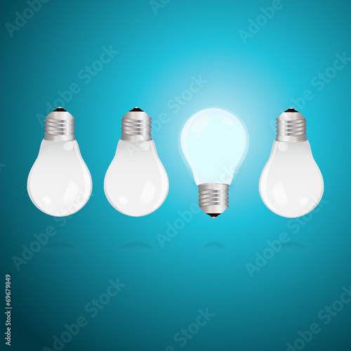Idea concept with light bulbs on a blue background