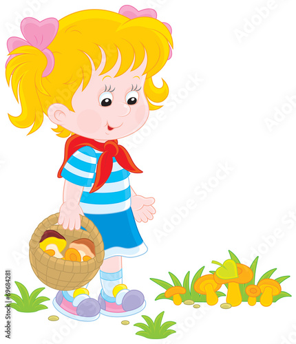 Little girl picking mushrooms