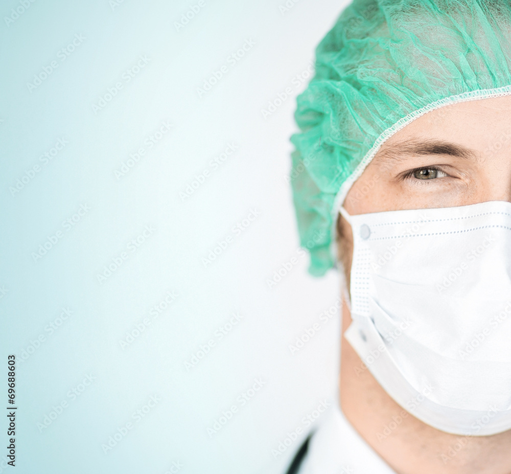 surgeon in medical cap and mask surgeon in medical cap and mask