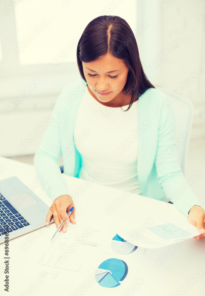 businesswoman or student with laptop and documents businesswoman or student with laptop and documents