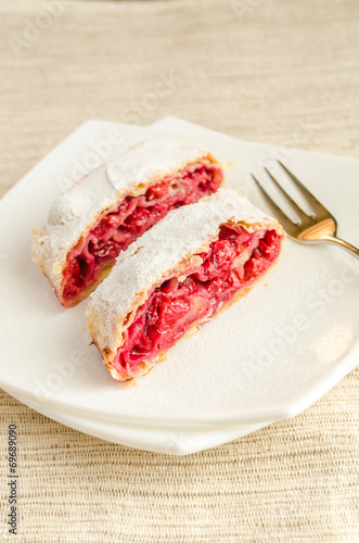 Cherry strudel on the square plate