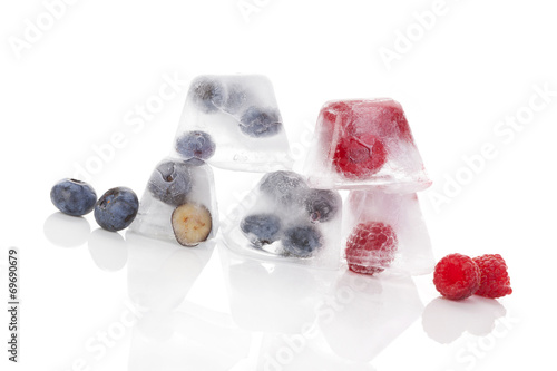 Fruits frozen in ice.