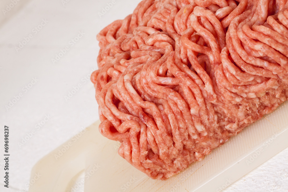 Block of commercial beef mince from a store Block of commercial beef mince from a store