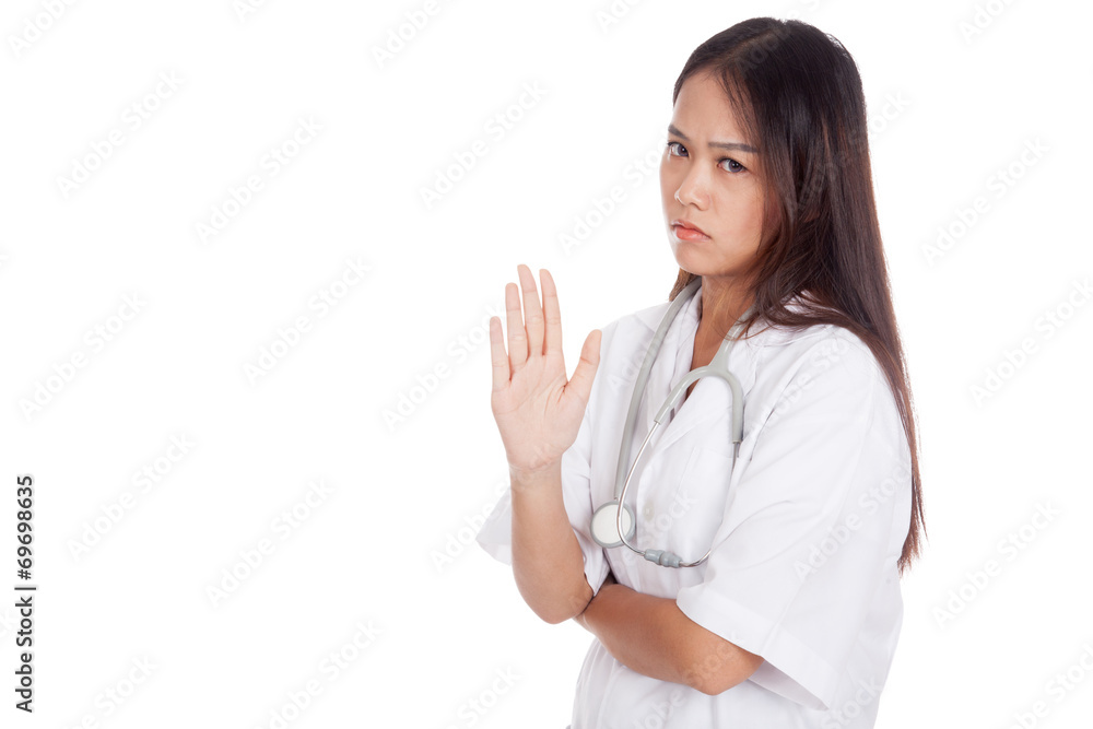 Asian young female doctor say talk to my hand Asian young female doctor say talk to my hand