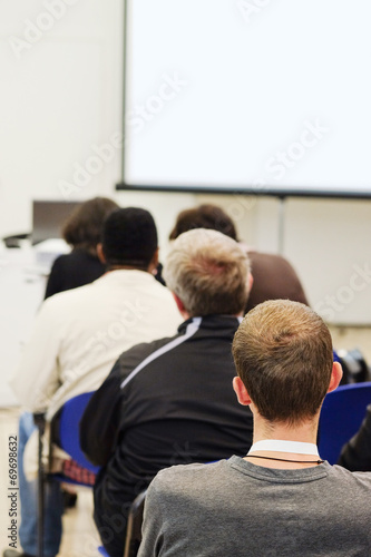 The audience listens to the acting