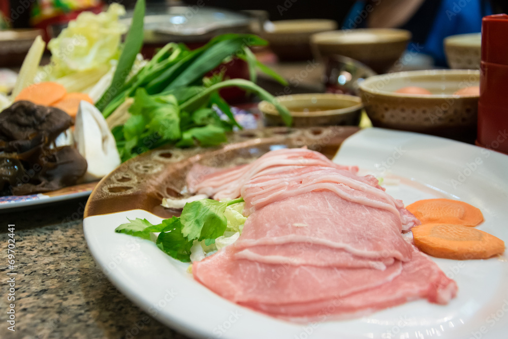 piece of Slide pork on dish for sukiyaki