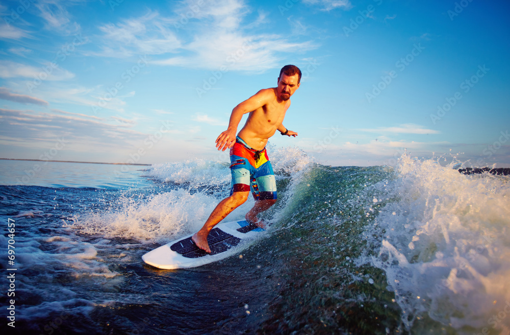 Man surfboarding