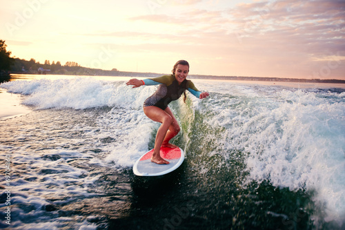 Female surfboarder photo