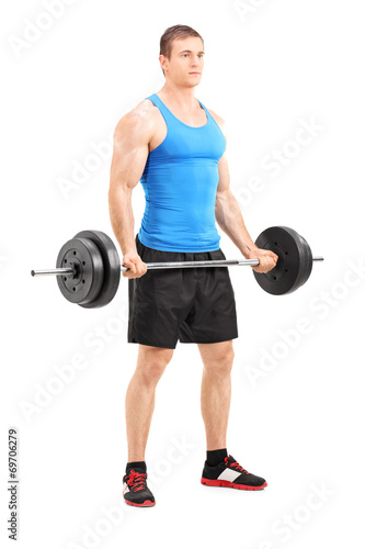 Male athlete exercising with a barbell