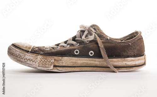Dirty tennis shoe side view