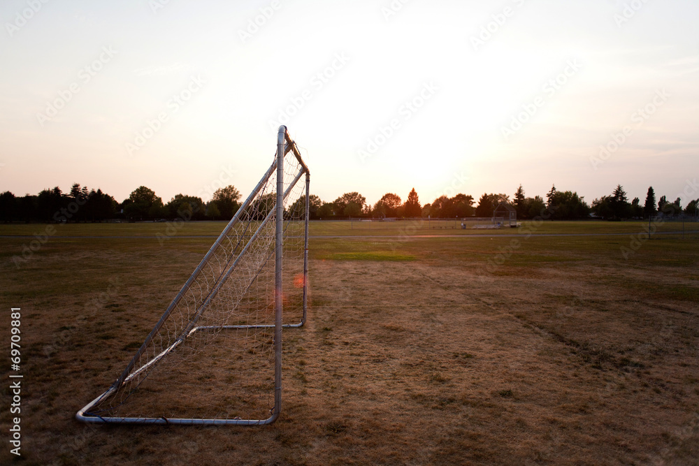 Fototapeta premium soccer field with sunset