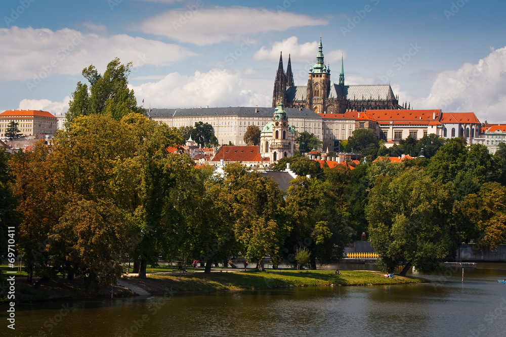 Old town of Prague as seen over river Vltava.