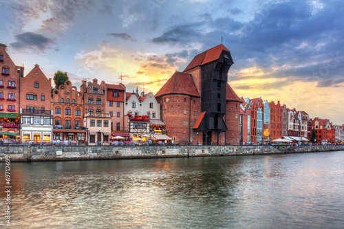Gdansk at sunset with reflection in Motlawa river, Poland