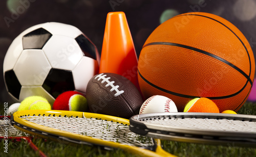 Assorted sports equipment and grass