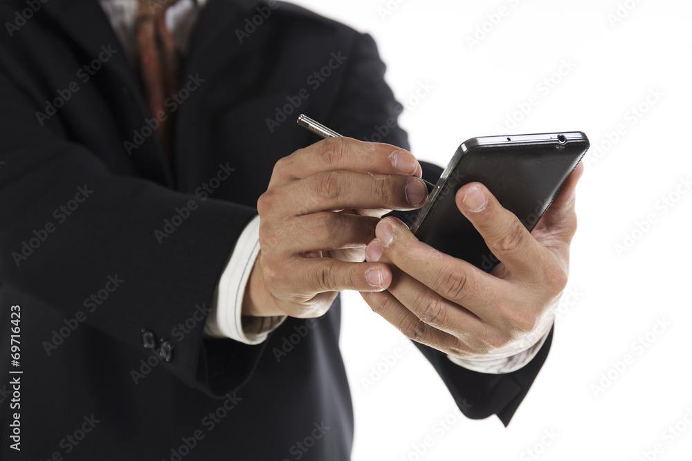 Hands of Businessman with stylus touching the screen of smart ph Hands of Businessman with stylus touching the screen of smart ph