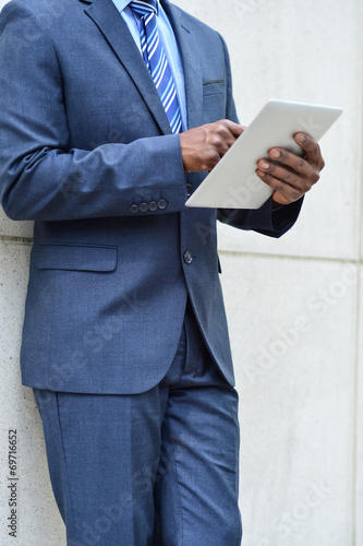Hands of the businessman using a tablet PC