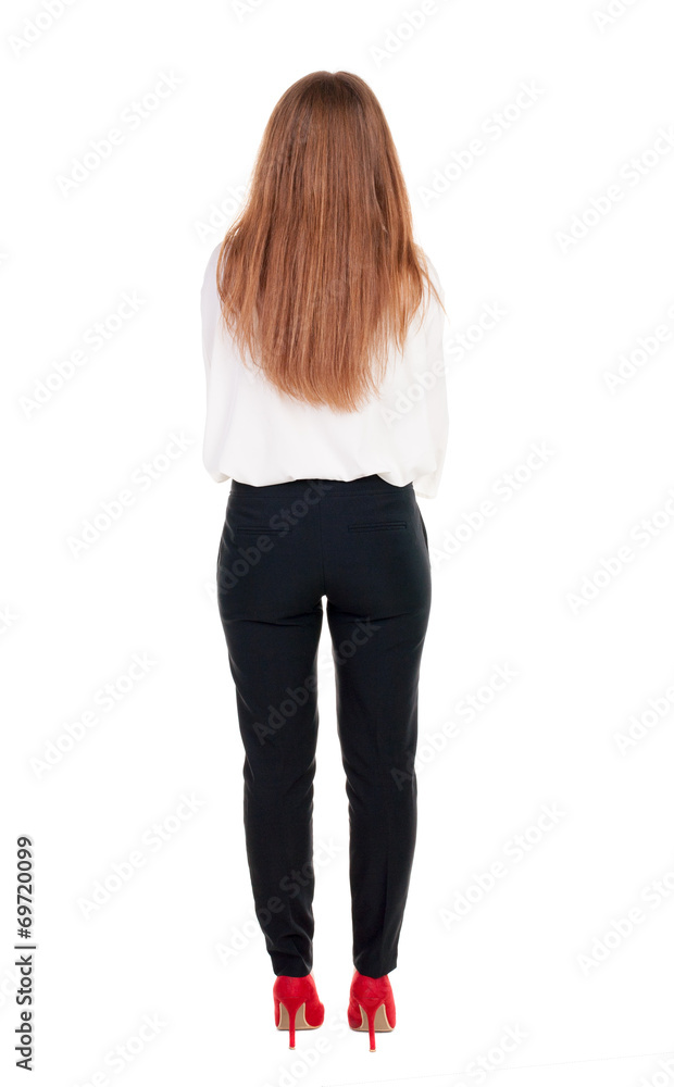 back view of redhead business woman contemplating. back view of redhead business woman contemplating.