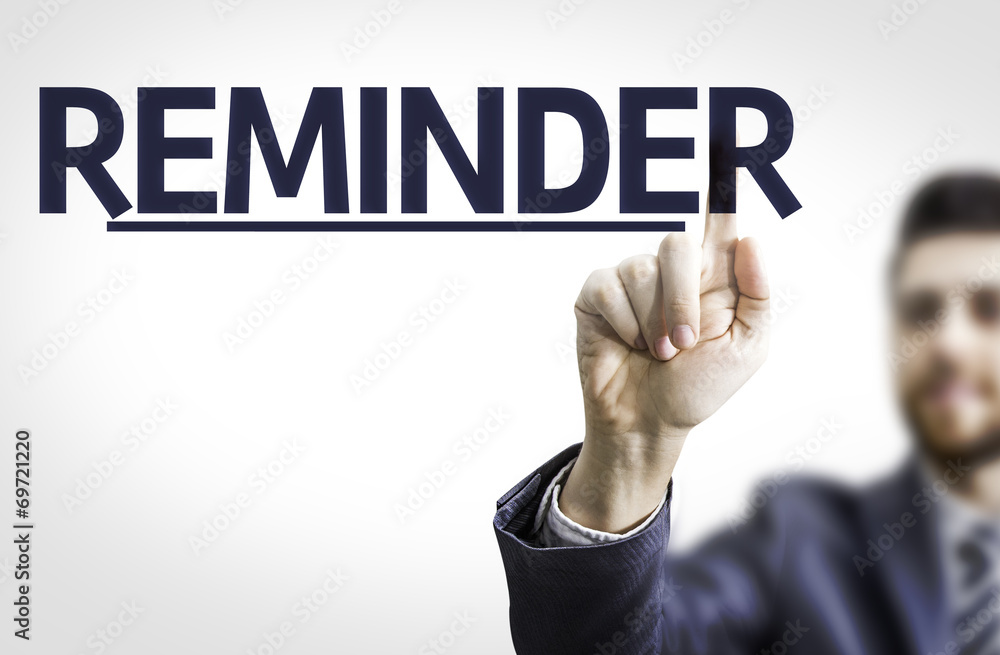 Business man pointing to transparent board with text: Reminder Business man pointing to transparent board with text: Reminder