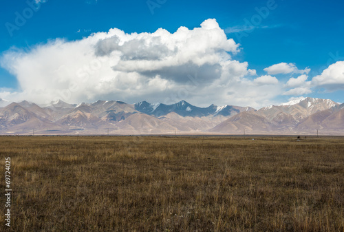 Incredible color of the sky and clouds over flat Tibetan plain © serg269