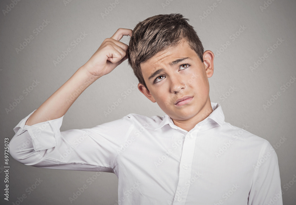 Man scratching head, thinking daydreaming about something Man scratching head, thinking daydreaming about something