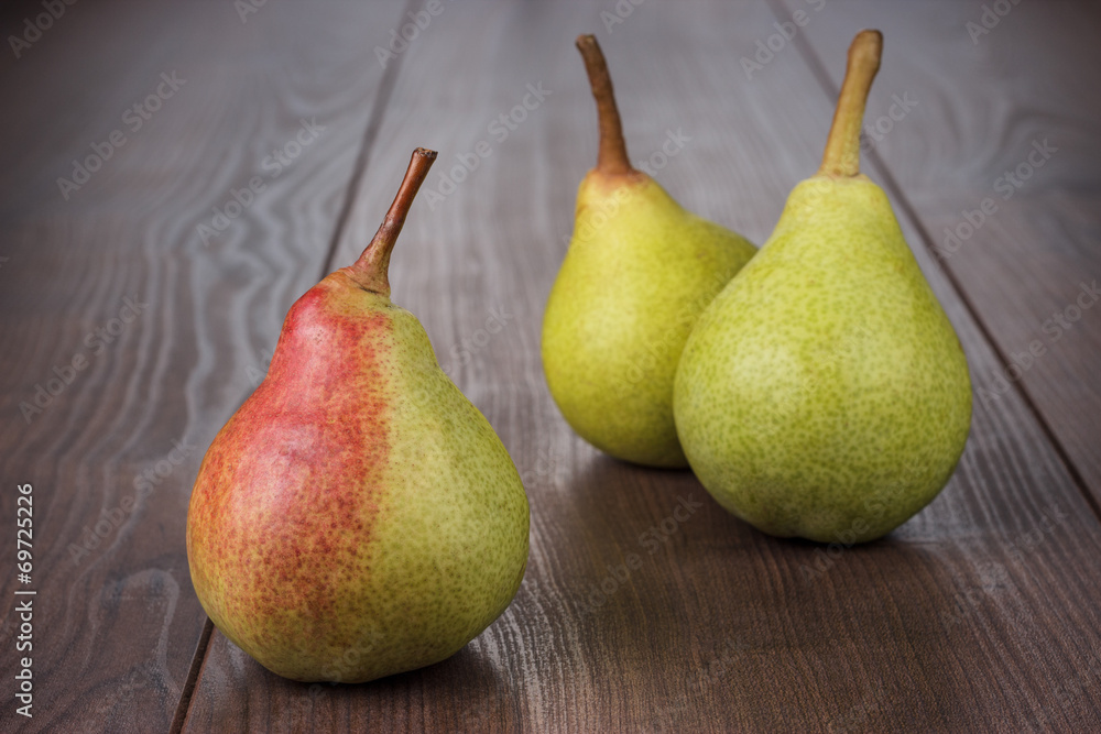 fresh pears on the wooden table
