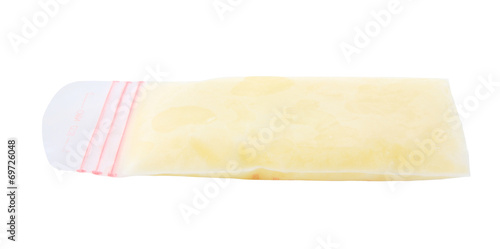 frozen breastmilk in bag isolated on white