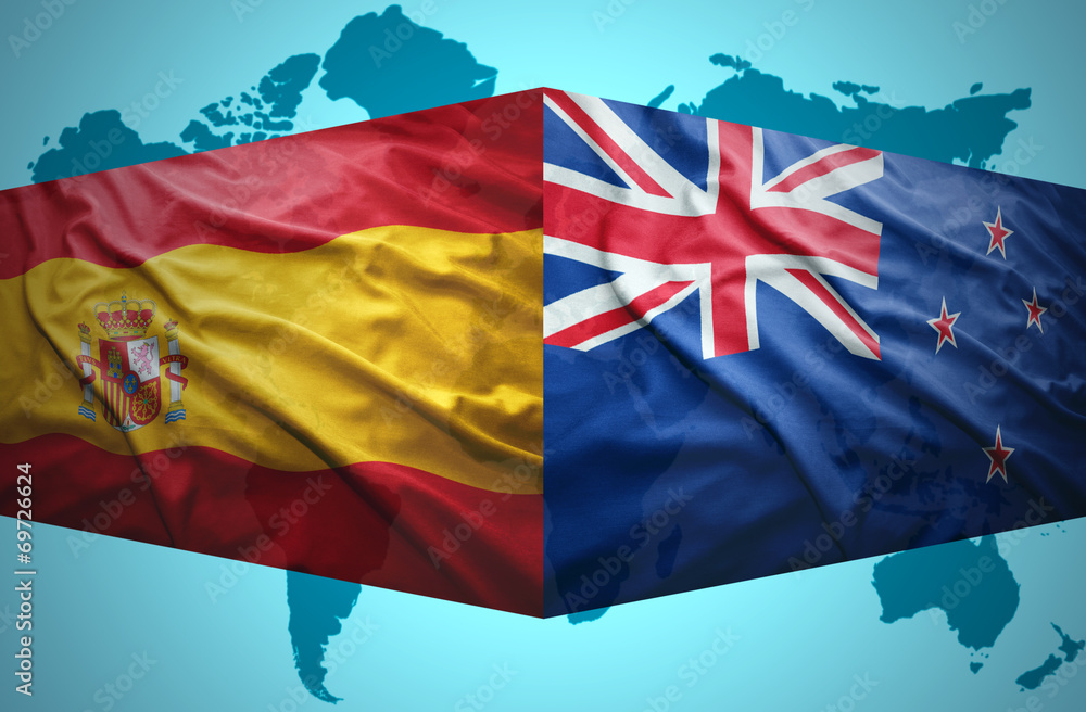 Waving New Zealand and Spanish flags Waving New Zealand and Spanish flags