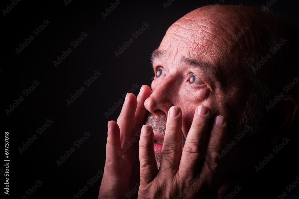 Fototapeta premium old man looking frighten or scared