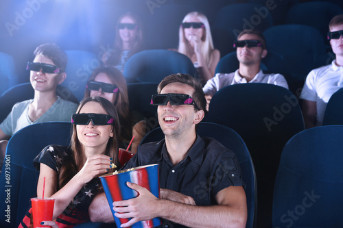 Young people watching movie...