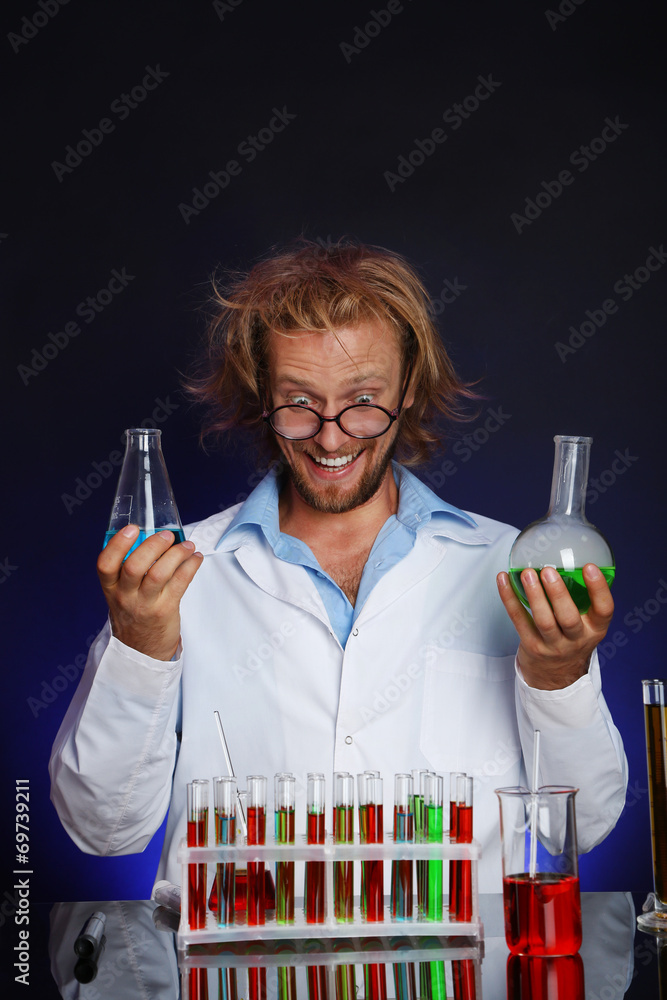 Crazy scientist working in laboratory Crazy scientist working in laboratory