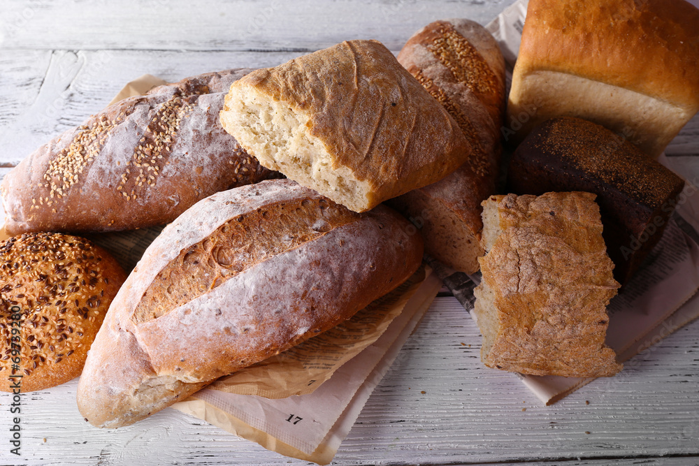 Fresh baked bread, on wooden background