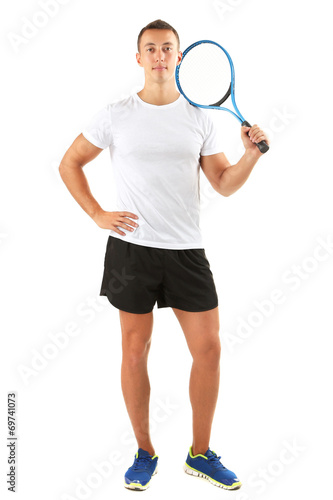 Handsome young sportsman holding racket isolated on white © Africa Studio