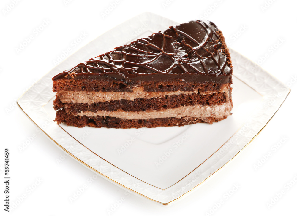 Chocolate cake on plate isolated on white Chocolate cake on plate isolated on white