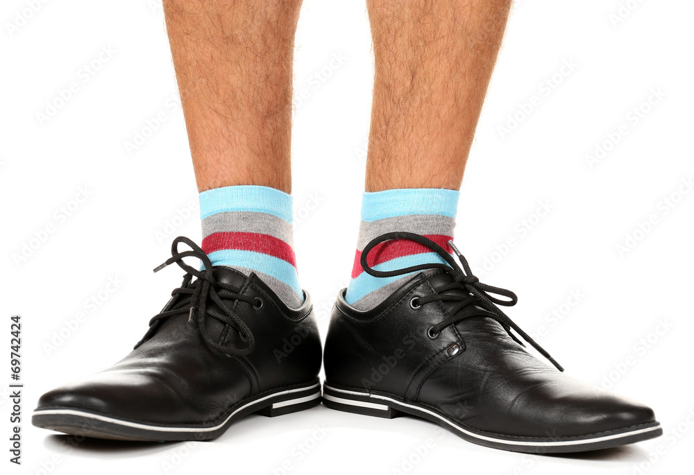 Man leg in suit and colorful socks, isolated on white