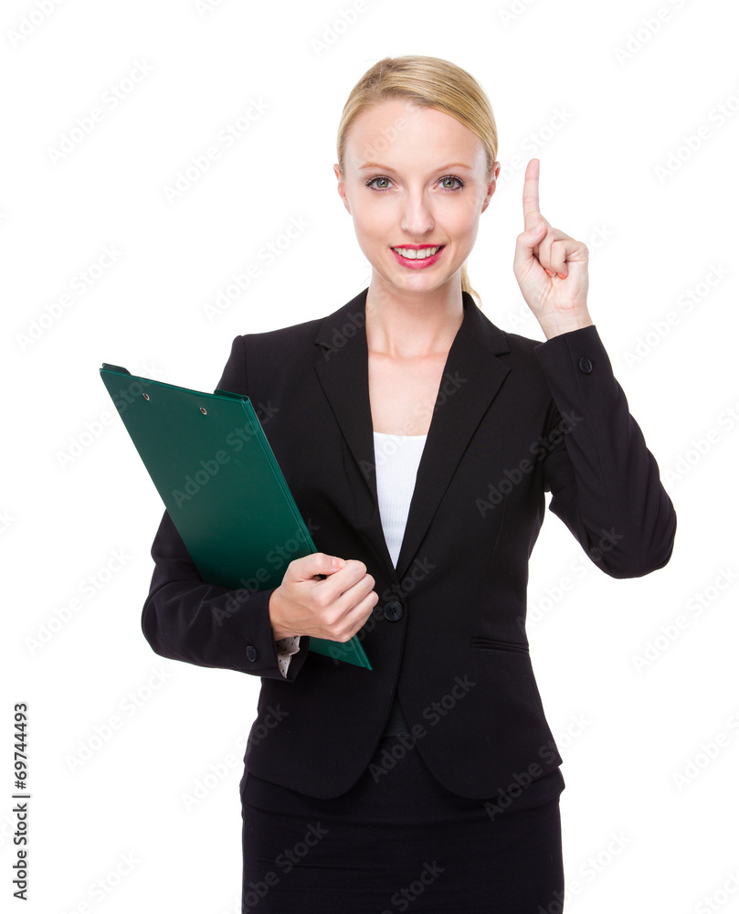 Businesswoman hold clipboard with finger point up Businesswoman hold clipboard with finger point up