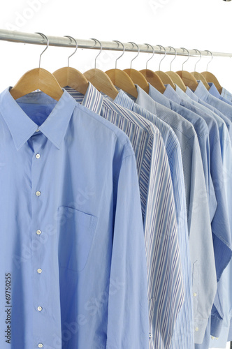blue shirts on hangers