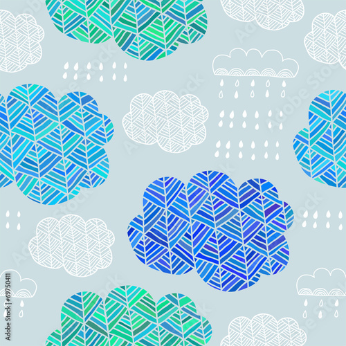 Seamless pattern of hand drawn doodle clouds