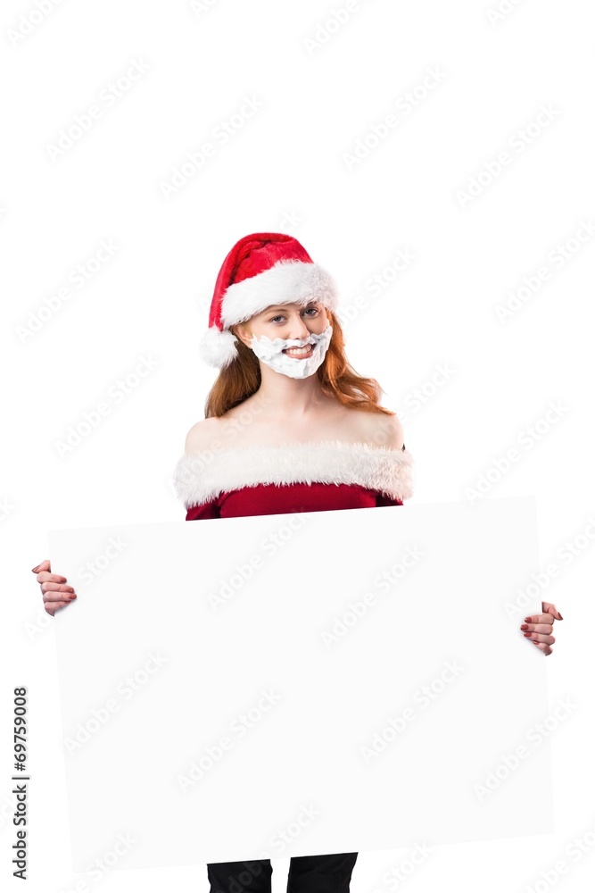 Festive redhead in foam beard holding poster Festive redhead in foam beard holding poster
