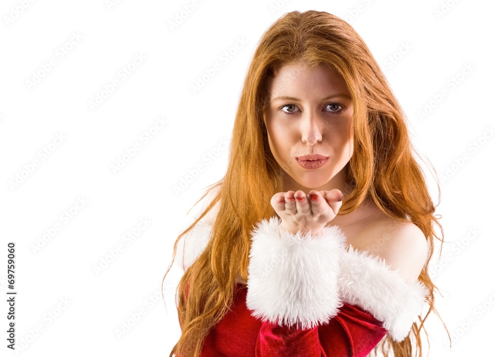 Festive redhead blowing a kiss Festive redhead blowing a kiss
