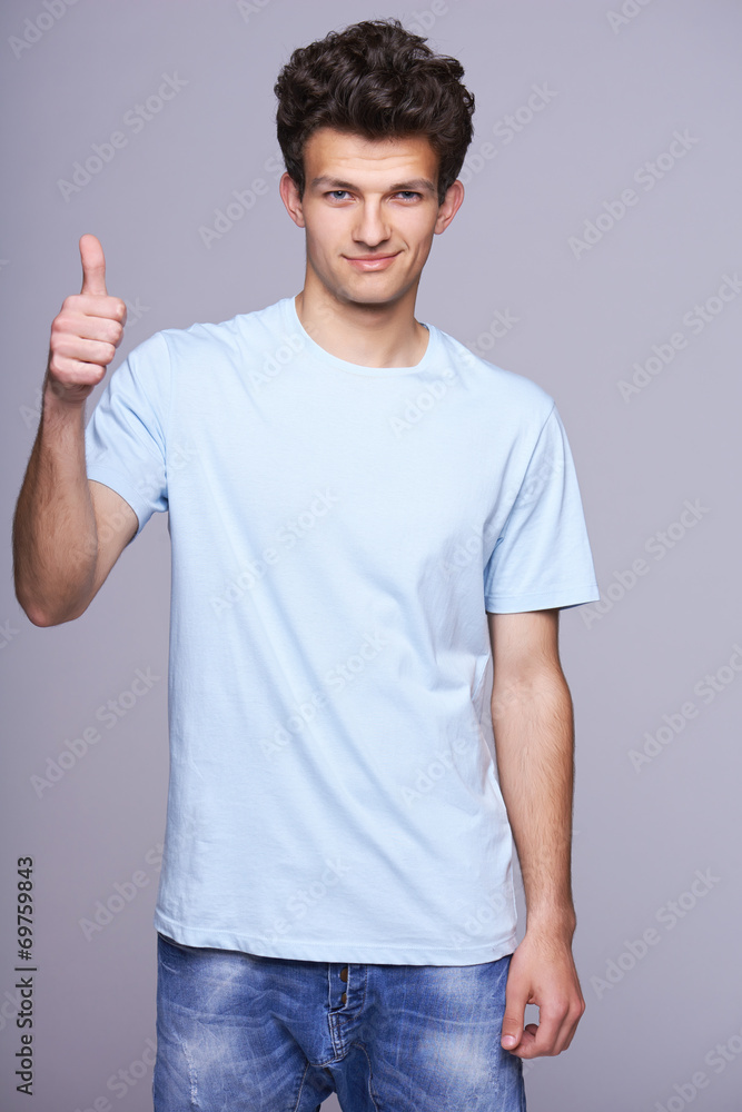 Handsome man in blank blue t-shirt Handsome man in blank blue t-shirt