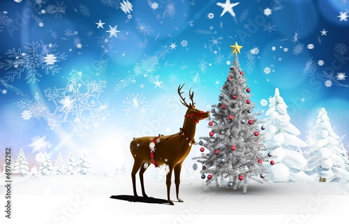 Composite image of christmas tree and reindeer © WavebreakMediaMicro