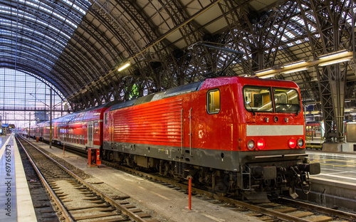 Electric locomotive with regional train in Frankfurt, Germany