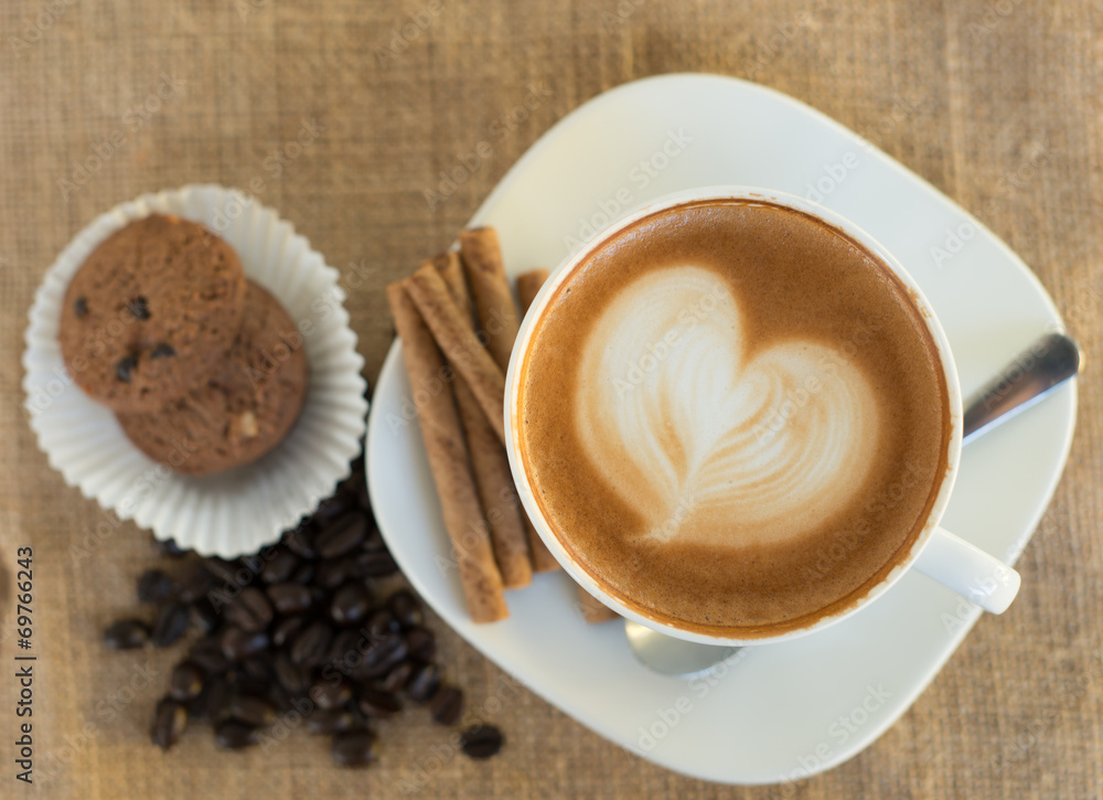 Cappuccino or latte coffee with heart shape Cappuccino or latte coffee with heart shape