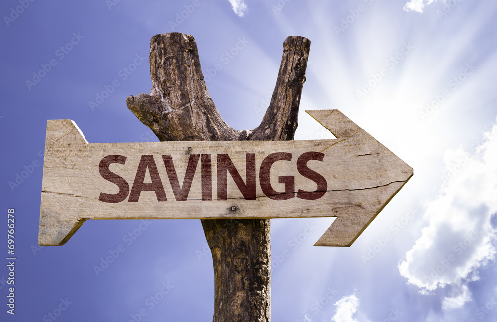 Savings wooden sign on a beautiful day