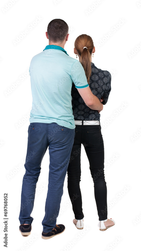 Back view of young embracing couple Back view of young embracing couple