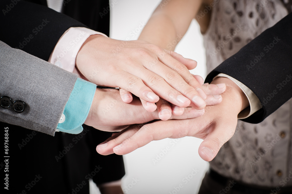 Business group with hands together - teamwork concepts Business group with hands together - teamwork concepts
