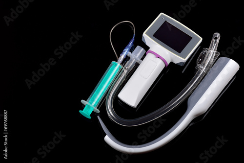 Video laryngoscope and cuffed endotracheal tube