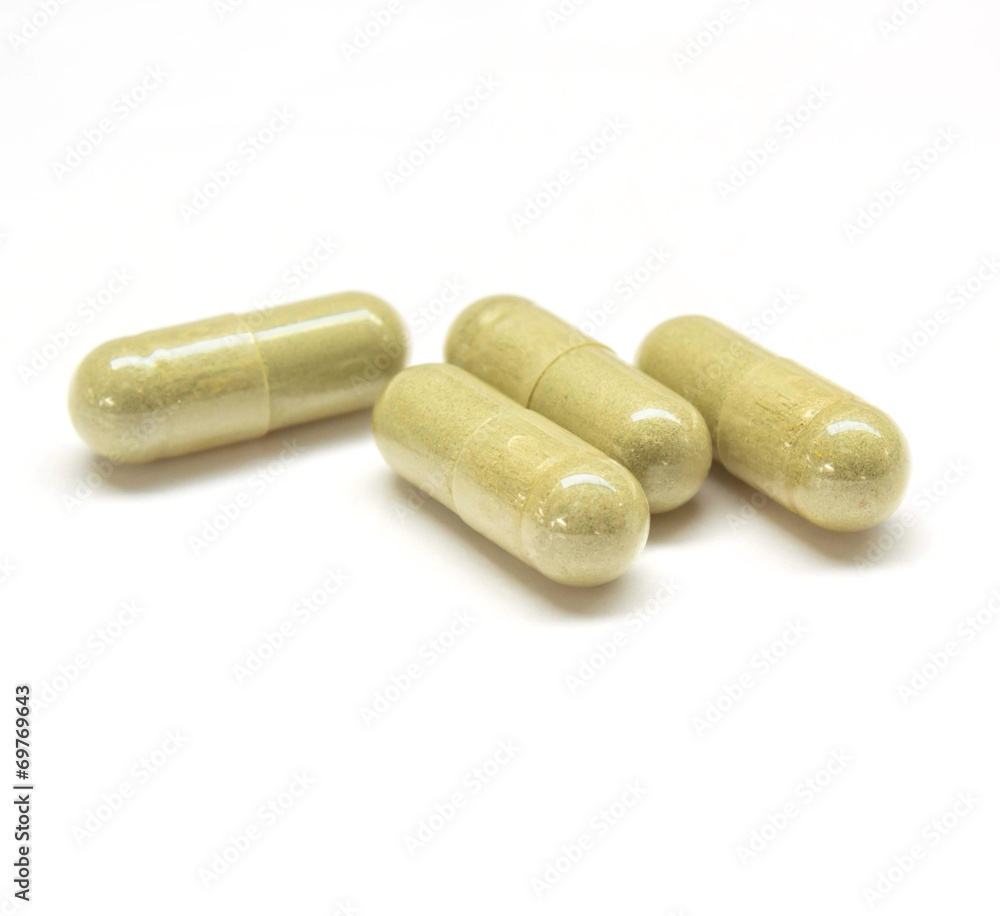 Close up andrographis paniculata herbal in capsule. Close up andrographis paniculata herbal in capsule.