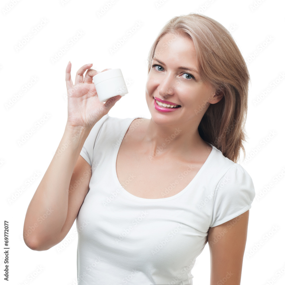 Beautiful woman holding a jar of cream isolated on white Beautiful woman holding a jar of cream isolated on white