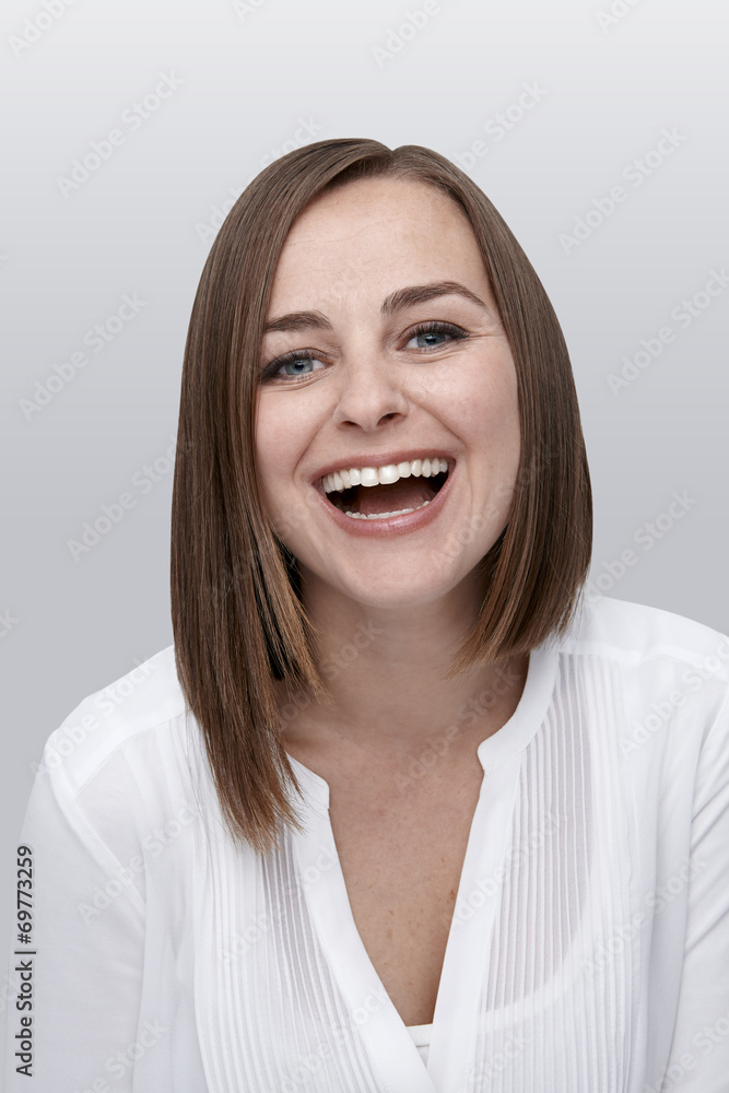 Young adult woman laughing Young adult woman laughing